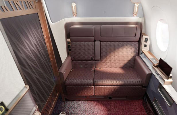 Reclining seats included footrests and leaned almost all the way back., The first-class cabin's gourmet dining remained., Flutes of Champagne were an added bonus., Spiral staircases led to the 747's upper deck lounge., Some early jumbo jets were even equipped with pianos., The massive double-decker entered service with Singapore Airlines in 2007., Two suites could even be merged to create a couple's suite., Emirates has also launched its own first-class suites., Amenities include access to an in-flight shower., However, the ultimate first-class experience comes courtesy of Etihad., Each 125-square-foot, three-room suite features an en suite bathroom with a shower., It also includes a private bedroom and a personal butler., Two suites can be joined to create a two-passenger mega-suite.