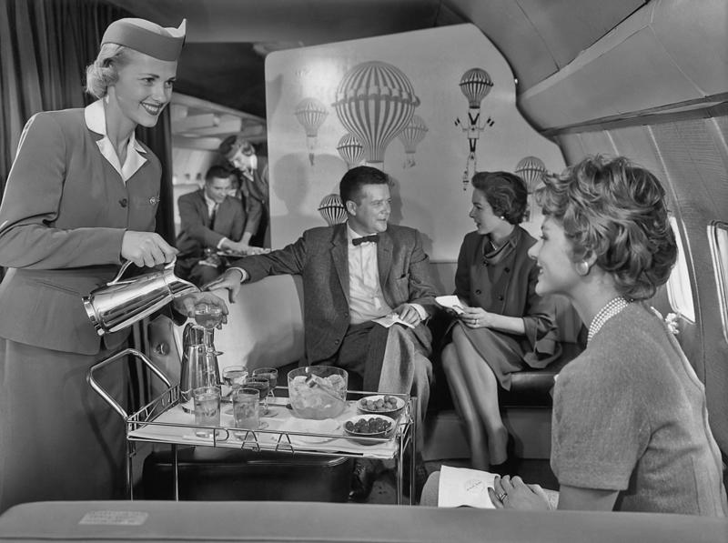 Reclining seats included footrests and leaned almost all the way back., The first-class cabin's gourmet dining remained., Flutes of Champagne were an added bonus., Spiral staircases led to the 747's upper deck lounge., Some early jumbo jets were even equipped with pianos., The massive double-decker entered service with Singapore Airlines in 2007., Two suites could even be merged to create a couple's suite., Emirates has also launched its own first-class suites., Amenities include access to an in-flight shower., However, the ultimate first-class experience comes courtesy of Etihad., Each 125-square-foot, three-room suite features an en suite bathroom with a shower., It also includes a private bedroom and a personal butler., Two suites can be joined to create a two-passenger mega-suite.