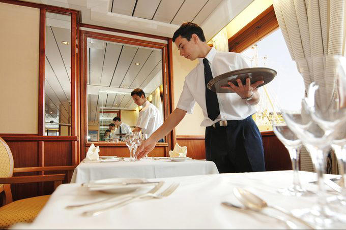 Cruise tips for the perfect trip, Booking too late, Not asking for an upgrade, Not packing a carry-on bag, Being rude or cold to the crew, Not taking advantage of flash deals, Using the internet a lot, Not signing up for the free loyalty program, Sticking to the buffets, Not using room service enough, Not reading the ship’s insurance policy, Going to Medical for seasickness, Not tipping your waiter, Taking sketchy DIY excursions, Going too far from the ship, Underestimating how windy it gets at sea, Not honoring cruise traditions, Not following current health protocols, Not booking your next cruise while you’re still on the ship