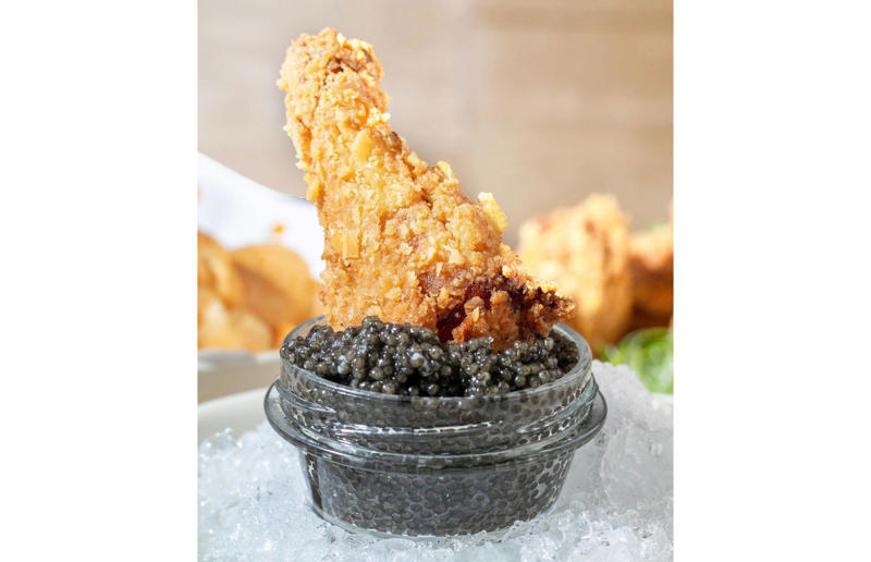 9. Fried Chicken & Osetra Caviar, Momofuku Noodle Bar, New York City, New York, USA 19. Bennelong sausage roll, Bennelong, Sydney, Australia, 18. The Golden Nugget, COQODAQ, New York City, New York, USA, 17. Hot Dog, Mischa, New York City, New York, USA, 16. Millionaire's Milkshake, Grill 'n' Shake, Cardiff, Wales, UK, 15. Dragon Dog, DougieDog Diner, Vancouver, Canada, 14. Barclay Prime Cheesesteak, Barclay Prime, Philadelphia, Pennsylvania, USA, 13. World's Most Expensive Fries, Serendipity3, New York City, New York, USA, 12. Quintessential Grilled Cheese Sandwich, Serendipity3, New York City, New York, USA, 11. Juuni Ban hot dog, Tokyo Dog, Seattle, Washington, USA, 10. Billion Dollar Popcorn, Berco's Popcorn, Chicago, Illinois, USA, 9. Fried Chicken & Osetra Caviar, Momofuku Noodle Bar, New York City, New York, USA, 8. Golden Opulence Sundae, Serendipity3, New York City, New York, USA, 7. ,000 bagel, Westin New York at Times Square, New York City, New York, USA, 6. Guinness World Record 24k Pizza, Industry Kitchen, New York City, New York, USA, 5. The Golden Boy burger, De Daltons, Voorthuizen, Netherlands, 4. The Posh Pie, The Lord Dudley Hotel, Sydney, Australia, 3. Louis XIII pizza, various locations, Italy, 2. Meat pie, The Fence Gate Inn, Burnley, Lancashire, England, UK