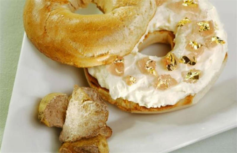 7. $1,000 bagel, Westin New York at Times Square, New York City, New York, USA 19. Bennelong sausage roll, Bennelong, Sydney, Australia, 18. The Golden Nugget, COQODAQ, New York City, New York, USA, 17. Hot Dog, Mischa, New York City, New York, USA, 16. Millionaire's Milkshake, Grill 'n' Shake, Cardiff, Wales, UK, 15. Dragon Dog, DougieDog Diner, Vancouver, Canada, 14. Barclay Prime Cheesesteak, Barclay Prime, Philadelphia, Pennsylvania, USA, 13. World's Most Expensive Fries, Serendipity3, New York City, New York, USA, 12. Quintessential Grilled Cheese Sandwich, Serendipity3, New York City, New York, USA, 11. Juuni Ban hot dog, Tokyo Dog, Seattle, Washington, USA, 10. Billion Dollar Popcorn, Berco's Popcorn, Chicago, Illinois, USA, 9. Fried Chicken & Osetra Caviar, Momofuku Noodle Bar, New York City, New York, USA, 8. Golden Opulence Sundae, Serendipity3, New York City, New York, USA, 7. ,000 bagel, Westin New York at Times Square, New York City, New York, USA, 6. Guinness World Record 24k Pizza, Industry Kitchen, New York City, New York, USA, 5. The Golden Boy burger, De Daltons, Voorthuizen, Netherlands, 4. The Posh Pie, The Lord Dudley Hotel, Sydney, Australia, 3. Louis XIII pizza, various locations, Italy, 2. Meat pie, The Fence Gate Inn, Burnley, Lancashire, England, UK