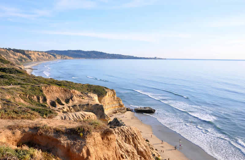 Torrey Pines State Natural Reserve, Museum of Contemporary Art San Diego, San Diego Zoo, Torrey Pines Golf Course, Belmont Park, Balboa Park, La Jolla Cove, Little Italy, Mission Basilica San Diego de Alcalá, Petco Park, Sunset Cliffs, Del Mar Racetrack, USS Midway Museum, Cabrillo National Monument, Barrio Logan, Coronado, Cedros Avenue Design District, North Park, Downtown Oceanside, Torrey Pines Gliderport, The Rady Shell at Jacobs Park