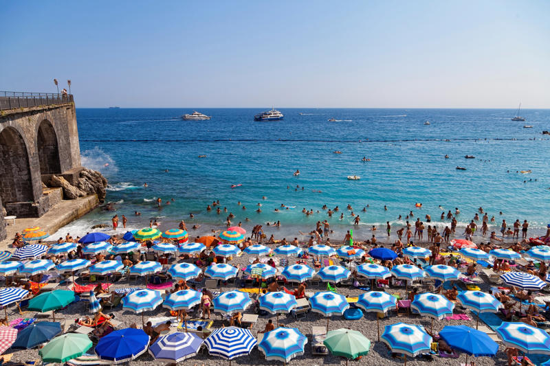 The 15 best beach towns in Italy Positano, The Lido, Torre Dell'Orso, Talamone, Elba Island, Cinque Terre, Porto Cesario, Santa Severa, Sardinia