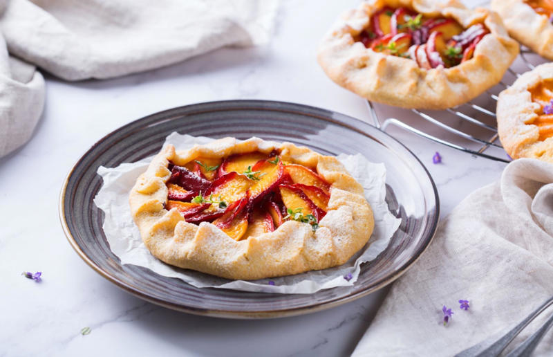 Nectarine galette Sugary-sweet air fryer treats, Berry crumble, Chocolate fondant, Nectarine galette, Profiteroles, 'Baked' peaches, Strawberry and cream tartlets, Baked pears in honey, S'mores cookies, Cinnamon French toast, Coconut macaroons, Blackened bananas, 'Grilled' pineapple, Banana bread, Amaretti biscuits, Chocolate chip cookies, Oat and raisin bars, Blueberry muffins, Snickerdoodles, Banana chips, Shortbread