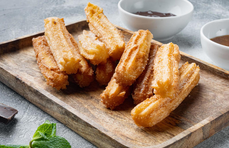 Churros Sugary-sweet air fryer treats, Berry crumble, Chocolate fondant, Nectarine galette, Profiteroles, 'Baked' peaches, Strawberry and cream tartlets, Baked pears in honey, S'mores cookies, Cinnamon French toast, Coconut macaroons, Blackened bananas, 'Grilled' pineapple, Banana bread, Amaretti biscuits, Chocolate chip cookies, Oat and raisin bars, Blueberry muffins, Snickerdoodles, Banana chips, Shortbread