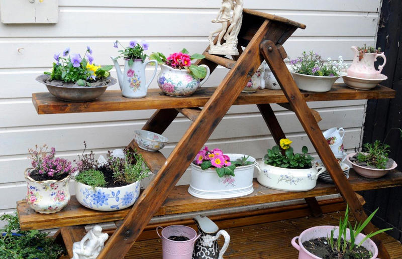 Refresh, reuse and recycle, Teacup bird feeder, Kids' stationery jars, Animal tin cans, Skateboard side table, Cork pot stand, Denim planters, Colander hanging basket, Découpage dresser, Ladder garden, Window shutter wall planter, Chalk painted furniture, Mason jar lights, Storage ladder, Outdoor plant dresser, Suitcase-style drawers, Blue sky fridge, Wooden bowl lamp, Children's drawers, Colourful candlesticks, Tin can planters, Textured set of drawers, Corkboard wall art, Reclaimed door bench, Bicycle bathroom vanity, Chair transformations, Cabinet update, Reclaimed wooden shelf, Plastic bottle garden chairs