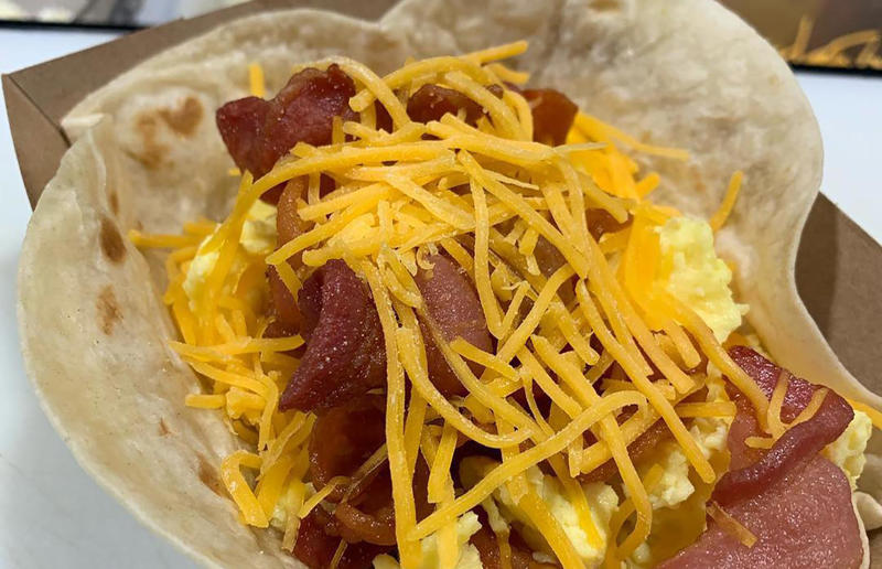 Idaho: Bacon, egg, and cheese breakfast tacos, Tin Roof Tacos, various locations Bacon with EVERYTHING, Alabama: BALT, Urban Cookhouse, various locations, Alaska: Fat Elvis milkshake, Snow City Cafe, Anchorage, Arizona: stuffed Medjool dates, J.T. Prime Kitchen & Cocktails, Yuma, Arkansas: Eggniter, Golden Kolache Bakery, Fayetteville, California: B’B’B’ Bacon, Slater's 50/50, various locations, Colorado: signature bacon flight, Bacon Social House, various locations, Connecticut: smoked mac & cheese, Pig Rig BBQ, Wallingford, Delaware: bacon cheese fries, m2o Burgers & Salads, Newark, District of Columbia: glazed bacon lollis, Founding Farmers, various locations, Florida: candied bacon maple ice cream, Ulele, Tampa, Georgia: BBQ bacon, Burger 21, Kennesaw and Buford, Hawaii: Fat Boy, Hank's Haute Dogs, Honolulu, Idaho: bacon, egg, and cheese breakfast tacos, Tin Roof Tacos, various locations, Illinois: cheeseburger, Au Cheval, Chicago, Indiana: BLT croissant, Rize, various locations, Iowa: pancake sandwich, The Breakfast Club, various locations, Kansas: bleu cheese and bacon burger, The Anchor, Wichita, Kentucky: maple bacon donut, Nord's Bakery, Louisville, Louisiana: Buckboard Bacon Melt, Cochon Butcher, New Orleans, Maine: bacon Cheddar, The Holy Donut, Portland, Maryland: Baltimore Burger, Abbey Burger Bistro, Baltimore and Havre de Grace, Massachusetts: 'Irish' nachos, Harry's Bar & Grill, Boston, Michigan: BLT, Tony’s I-75, Birch Run, Minnesota: Millionaire bacon burger, Granite City Food & Brewery, various locations, Mississippi: Redneck Benny, Big Bad Breakfast, Oxford, Missouri: The Combo, Songbird, St. Louis, Montana: The 'Mazatlan' Mexican Dog, The Burger Dive, Billings, Nebraska: Greatest Burger Ever, Honest Abe’s Burgers & Freedom, Lincoln, Nebraska, Nevada: 24K Burger, Slater's 50/50, Las Vegas, New Hampshire: Bacon Bene, The Bacon Barn, Londonderry, New Jersey: bacon brisket sandwich, Bake'n Bacon, Cape May, New Mexico: BB&C, Urban Hotdog Company, Albuquerque, New York: Clothesline Bacon, David Burke Tavern, New York City, North Carolina: BLT, Merritt's Grill, Chapel Hill, North Dakota: The Elvis, Bearscat Bakehouse, Bismarck and Minot, Ohio: Biscuit BLT, Dough Mama, Columbus, Oklahoma: Brussels sprouts, Packard’s, Oklahoma City, Oregon: praline bacon, Screen Door, Portland, Pennsylvania: bacon flight, Bacon, Bourbon & Beer, Washington, Rhode Island: BLT, The Malted Barley, Providence, South Carolina: candied bacon brownie, Nose Dive, Greenville, South Dakota: bacon wrapped filet mignon, Alpine Inn, Hill City, Tennessee: Southern Sampler Breakfast, The Loveless Cafe, Nashville, Texas: chicken fried bacon, Sodolak's Original Country Inn, Snook, Utah: roasted bacon wrapped dates, Midway Mercantile Restaurant, Midway, Vermont: Breakfast Mac, Our House Bistro, Winooski, Virginia: Mother Clucker, Capitol Waffle Shop, various locations, Washington: Meatza, Windy City Pie, Seattle, West Virginia: hot chicken sandwich with bacon, Wood Iron Eatery, Fayetteville, Wisconsin: tequila jam burger, 11:11 Burgers & Beignets, Fond Du Lac, Wisconsin