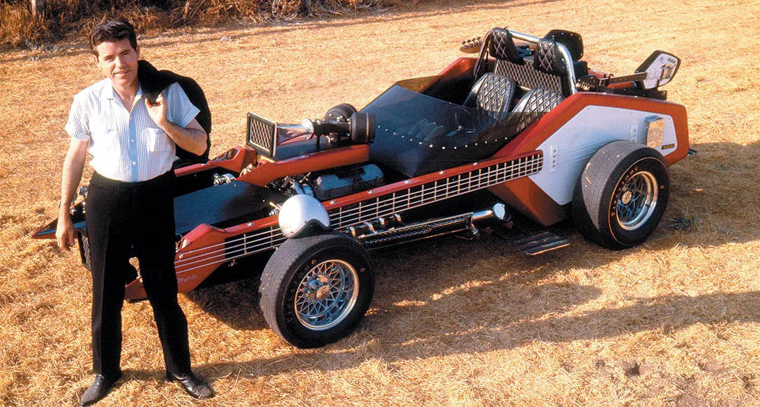 Voxmobile (cont’d) All Hail The King Of The Kustomizers, Barris' Ferrari 308 GTS, Barris' Ferrari 308 GTS (cont’d), T Buggy Prototype, T Buggy Prototype (cont’d), Bill Carr’s 1955 Chevrolet “Aztec”, Bill Carr’s 1955 Chevrolet “Aztec” (cont’d), Munster Koach, Munster Koach (cont’d), 1966 Batmobile, 1966 Batmobile (cont’d), Ala Kart, Ala Kart (cont’d), 1998 Mercury Cougar “Woodie” 2050, 1998 Mercury Cougar “Woodie” 2050 (cont’d), The Barrister, The Barrister (cont’d), Bob Nordskog's 1963 "Asteroid" Corvette, Bob Nordskog's 1963 "Asteroid" Corvette (cont’d), Barris’ 1975 SnakePit, Barris’ 1975 SnakePit (cont’d), 1958 Custom Corvette, 1958 Custom Corvette (cont’d), Jurassic Park Tour Vehicles, Jurassic Park Tour Vehicles (cont’d), The Emperor, The Emperor (cont’d), Voxmobile, Voxmobile (cont’d), Kargoyle, Kargoyle (cont’d)