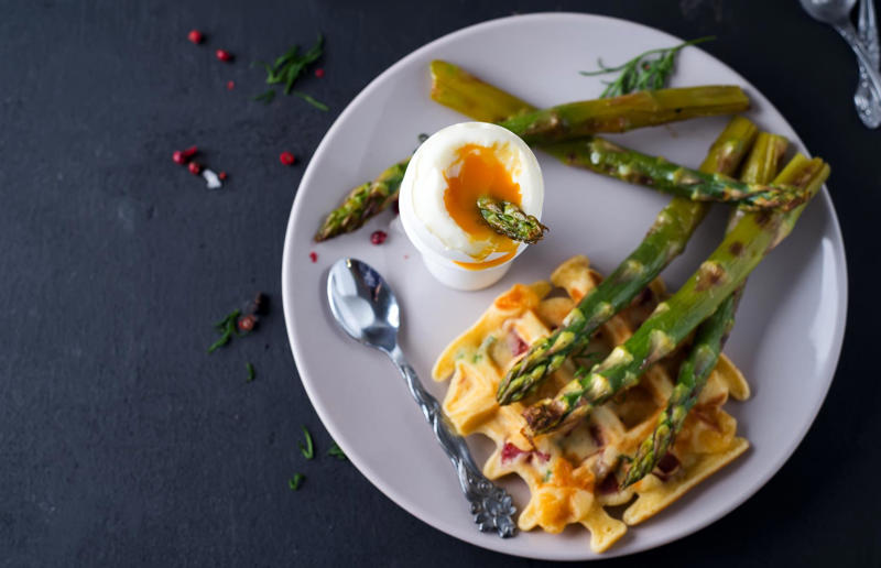 Parmesan waffles with jammy eggs and asparagus Wonderful waffles, Pick the right waffle iron for you, Think about ingredients, Aim for lump-free batter, Whisk, but don’t over-whisk, Make the batter in advance, Get the waffle iron hot, Separate your eggs, Add oil for crispy waffles, Don't just use your iron for waffles, Cornbread waffles, Sourdough waffles, Potato rösti waffles, Falafel waffles, Charcoal waffles, Sweet potato waffles, Avocado, asparagus and rocket waffles, Pizza breakfast waffles, Fried chicken and waffles, Parmesan waffles with jammy eggs and asparagus, Waffle Benedict, Waffle sandwiches, Avocado and smoked salmon waffles, Scandi-style waffles, Spinach waffles, Berries and maple syrup, Creamy berry and chocolate waffles, Sour cream waffles, Gluten-free waffles, Chocolate waffles, Vegan waffles, Beyond berries..., Bubble waffles, Pecan praline waffles, Waffle cones