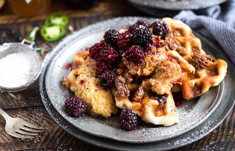 Fried chicken and waffles Wonderful waffles, Pick the right waffle iron for you, Think about ingredients, Aim for lump-free batter, Whisk, but don’t over-whisk, Make the batter in advance, Get the waffle iron hot, Separate your eggs, Add oil for crispy waffles, Don't just use your iron for waffles, Cornbread waffles, Sourdough waffles, Potato rösti waffles, Falafel waffles, Charcoal waffles, Sweet potato waffles, Avocado, asparagus and rocket waffles, Pizza breakfast waffles, Fried chicken and waffles, Parmesan waffles with jammy eggs and asparagus, Waffle Benedict, Waffle sandwiches, Avocado and smoked salmon waffles, Scandi-style waffles, Spinach waffles, Berries and maple syrup, Creamy berry and chocolate waffles, Sour cream waffles, Gluten-free waffles, Chocolate waffles, Vegan waffles, Beyond berries..., Bubble waffles, Pecan praline waffles, Waffle cones