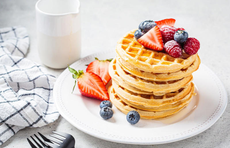 Berries and maple syrup Wonderful waffles, Pick the right waffle iron for you, Think about ingredients, Aim for lump-free batter, Whisk, but don’t over-whisk, Make the batter in advance, Get the waffle iron hot, Separate your eggs, Add oil for crispy waffles, Don't just use your iron for waffles, Cornbread waffles, Sourdough waffles, Potato rösti waffles, Falafel waffles, Charcoal waffles, Sweet potato waffles, Avocado, asparagus and rocket waffles, Pizza breakfast waffles, Fried chicken and waffles, Parmesan waffles with jammy eggs and asparagus, Waffle Benedict, Waffle sandwiches, Avocado and smoked salmon waffles, Scandi-style waffles, Spinach waffles, Berries and maple syrup, Creamy berry and chocolate waffles, Sour cream waffles, Gluten-free waffles, Chocolate waffles, Vegan waffles, Beyond berries..., Bubble waffles, Pecan praline waffles, Waffle cones