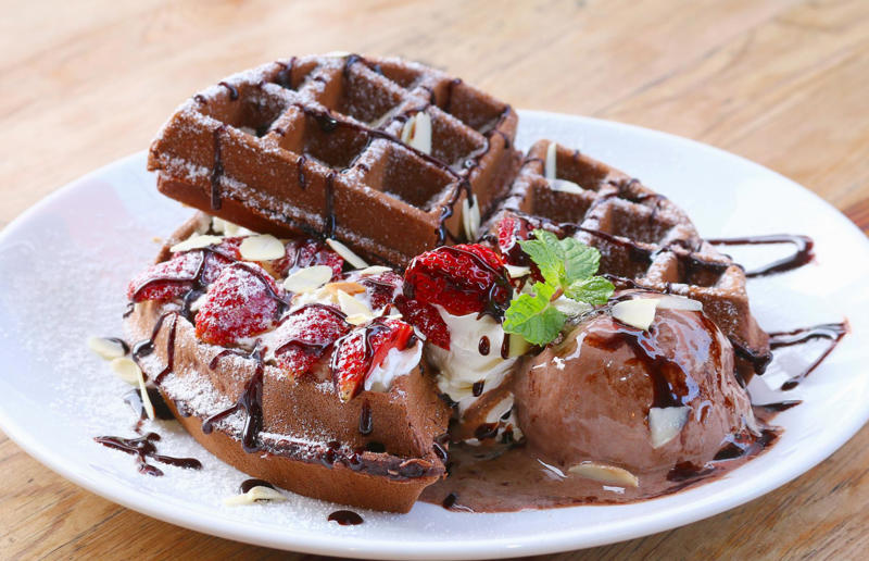 Chocolate waffles Wonderful waffles, Pick the right waffle iron for you, Think about ingredients, Aim for lump-free batter, Whisk, but don’t over-whisk, Make the batter in advance, Get the waffle iron hot, Separate your eggs, Add oil for crispy waffles, Don't just use your iron for waffles, Cornbread waffles, Sourdough waffles, Potato rösti waffles, Falafel waffles, Charcoal waffles, Sweet potato waffles, Avocado, asparagus and rocket waffles, Pizza breakfast waffles, Fried chicken and waffles, Parmesan waffles with jammy eggs and asparagus, Waffle Benedict, Waffle sandwiches, Avocado and smoked salmon waffles, Scandi-style waffles, Spinach waffles, Berries and maple syrup, Creamy berry and chocolate waffles, Sour cream waffles, Gluten-free waffles, Chocolate waffles, Vegan waffles, Beyond berries..., Bubble waffles, Pecan praline waffles, Waffle cones
