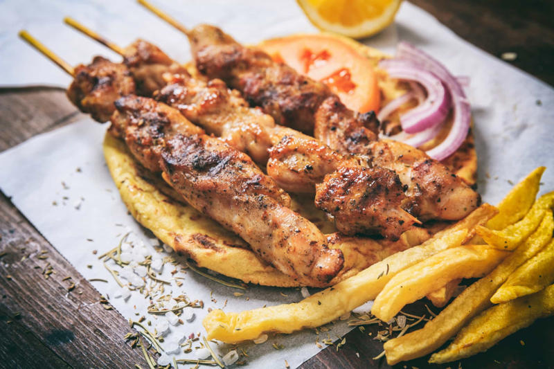 Caribbean barbacoa, Balkan ćevapčići, Argentinian asado, Indian tandoor, Brazilian churrasco, Japanese yakitori, Shawarma, Beer-flavored bratwurst, Turkish lamb kebabs, Greek souvlaki, Jamaican jerk chicken, Yucatán chicken, Italian lamb chops, Japanese shrimp skewers