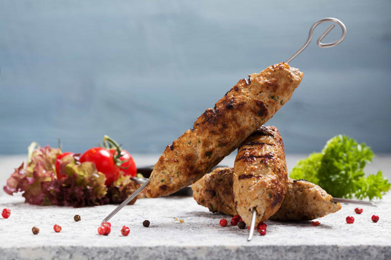 Caribbean barbacoa, Balkan ćevapčići, Argentinian asado, Indian tandoor, Brazilian churrasco, Japanese yakitori, Shawarma, Beer-flavored bratwurst, Turkish lamb kebabs, Greek souvlaki, Jamaican jerk chicken, Yucatán chicken, Italian lamb chops, Japanese shrimp skewers