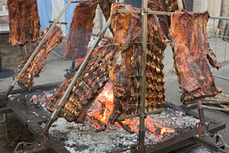 Caribbean barbacoa, Balkan ćevapčići, Argentinian asado, Indian tandoor, Brazilian churrasco, Japanese yakitori, Shawarma, Beer-flavored bratwurst, Turkish lamb kebabs, Greek souvlaki, Jamaican jerk chicken, Yucatán chicken, Italian lamb chops, Japanese shrimp skewers