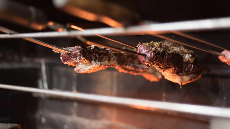 Caribbean barbacoa, Balkan ćevapčići, Argentinian asado, Indian tandoor, Brazilian churrasco, Japanese yakitori, Shawarma, Beer-flavored bratwurst, Turkish lamb kebabs, Greek souvlaki, Jamaican jerk chicken, Yucatán chicken, Italian lamb chops, Japanese shrimp skewers