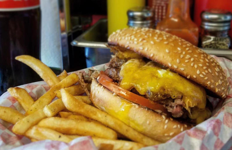 5. Alaska: The Burger Stop, Tommy's Burger Stop, Anchorage 54. Tennessee: Dyer's Single, Dyer's Burgers, Memphis, 53. Alabama: hamburger, Dub's Burgers, Athens, 52. Connecticut: The Original Burger, Louis' Lunch, New Haven, 51. California: Steakburger, The Apple Pan, Los Angeles, 50. Iowa: hamburger, B-Bops, various locations, 49. Maine: hamburger, Black Cow, Portland, 48. New Jersey: hamburger, White Manna, Hackensack, 47. New Hampshire: hamburger, Gilley’s Diner, Portsmouth, 46. Massachusetts: Hamburg, White Hut, West Springfield, 45. California: hamburger, In-N-Out Burger, various locations, 44. District of Columbia: Farmhouse Burger, Good Stuff Eatery, Georgetown, 43. Mississippi: Slugburger, Latham's Hamburger Inn, New Albany, 42. Utah: Big Ben, Burger Bar, Roy, 41. Wisconsin: hamburger, Sobelman's Pub & Grill, Milwaukee, 40. Wyoming: The Liberty Burger, Liberty Burger, Jackson, 39. Illinois: House-blend prime beef burger, Butcher & The Burger, Chicago, 38. Arizona: The Standard at The Stand Arcadia Burger Shoppe, Phoenix, 37. Colorado: Cricket Burger, The Cherry Cricket, Denver, 36. New York: Luger burger, Peter Luger Steakhouse, New York City, 35. Delaware: FTC, Farmer & the Cow, Wilmington, 34. Minnesota: Jucy Lucy, Matt’s Bar, Minneapolis, 33. Pennsylvania: hamburger, M2O Burgers & Salads, Philadelphia, 32. South Carolina: Classic, Big Gun Burger Shop, Charleston, 31. Idaho: The Classic, Holy Cow!, Nampa, 30. Kansas: House Burger, Dempsey's Burger Pub, Wichita, 29. Missouri: hamburger, Town Topic, Kansas City, 28. Nebraska: The Original, Cheeseburgers, Omaha, 27. New Mexico: Rustic, Rustic On The Green, Albuquerque, 26. Indiana: Smash burger, Workingman’s Friend, Indianapolis, 25. Vermont: Worthy Burger, Worthy Burger, South Royalton and Woodstock, 24. Arkansas: traditional hamburger, Hugo's, Fayetteville, 23. Texas: Tookie's Burger, Tookie's Hamburgers & More, Kemah, 22. Nevada: Plain Jane, Beefy's, Reno, 21. Georgia: Green Truck Classic, Green Truck Pub, Savannah, 20. New York: hamburger, All-American Hamburger Drive-In, Massapequa, 19. North Dakota: Carport, Sickies Garage Burgers & Brews, various locations, 18. Michigan: sliders, Motz’s Burgers, Detroit, 17. Michigan: Ground Round, Miller’s Bar, Dearborn, 16. Florida: hamburger, Mac's Drive-Thru, Gainesville, 15. West Virginia: Oscar, Oscar’s Breakfast, Burgers & Brews, Barboursville, 14. North Carolina: hamburger, Brooks’ Sandwich House, Charlotte, 13. Kentucky: The Purist, Bard's Burgers & Chili, Covington, 12. Maryland: Hamburger, Burger Bros., Towson, 11. Oklahoma: single onion burger, Tucker's Onion Burgers, various locations, 10. Rhode Island: Stanley Burger, Stanley’s Famous Hamburgers, Central Falls, 9. Virginia: Beauvine, Beauvine Burger Concept, Richmond, 8. Oregon: The Original 100, Hwy 101 Burger, Lincoln City, 7. Ohio: hamburger, Kewpee Hamburgers, Lima, 6. Hawaii: hamburger, Kua Aina Sandwich Shop, Haleiwa, 5. Alaska: The Burger Stop, Tommy's Burger Stop, Anchorage, 4. Montana: Hamburger, The Burger Drive, Billings, 3. Washington: Seattle Classic, Von's 1000 Spirits, Seattle, 2. Louisiana: Butcher Burger, Cochon Butcher, New Orleans