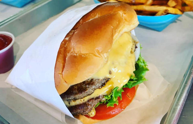 38. Arizona: The Standard at The Stand Arcadia Burger Shoppe, Phoenix 54. Tennessee: Dyer's Single, Dyer's Burgers, Memphis, 53. Alabama: hamburger, Dub's Burgers, Athens, 52. Connecticut: The Original Burger, Louis' Lunch, New Haven, 51. California: Steakburger, The Apple Pan, Los Angeles, 50. Iowa: hamburger, B-Bops, various locations, 49. Maine: hamburger, Black Cow, Portland, 48. New Jersey: hamburger, White Manna, Hackensack, 47. New Hampshire: hamburger, Gilley’s Diner, Portsmouth, 46. Massachusetts: Hamburg, White Hut, West Springfield, 45. California: hamburger, In-N-Out Burger, various locations, 44. District of Columbia: Farmhouse Burger, Good Stuff Eatery, Georgetown, 43. Mississippi: Slugburger, Latham's Hamburger Inn, New Albany, 42. Utah: Big Ben, Burger Bar, Roy, 41. Wisconsin: hamburger, Sobelman's Pub & Grill, Milwaukee, 40. Wyoming: The Liberty Burger, Liberty Burger, Jackson, 39. Illinois: House-blend prime beef burger, Butcher & The Burger, Chicago, 38. Arizona: The Standard at The Stand Arcadia Burger Shoppe, Phoenix, 37. Colorado: Cricket Burger, The Cherry Cricket, Denver, 36. New York: Luger burger, Peter Luger Steakhouse, New York City, 35. Delaware: FTC, Farmer & the Cow, Wilmington, 34. Minnesota: Jucy Lucy, Matt’s Bar, Minneapolis, 33. Pennsylvania: hamburger, M2O Burgers & Salads, Philadelphia, 32. South Carolina: Classic, Big Gun Burger Shop, Charleston, 31. Idaho: The Classic, Holy Cow!, Nampa, 30. Kansas: House Burger, Dempsey's Burger Pub, Wichita, 29. Missouri: hamburger, Town Topic, Kansas City, 28. Nebraska: The Original, Cheeseburgers, Omaha, 27. New Mexico: Rustic, Rustic On The Green, Albuquerque, 26. Indiana: Smash burger, Workingman’s Friend, Indianapolis, 25. Vermont: Worthy Burger, Worthy Burger, South Royalton and Woodstock, 24. Arkansas: traditional hamburger, Hugo's, Fayetteville, 23. Texas: Tookie's Burger, Tookie's Hamburgers & More, Kemah, 22. Nevada: Plain Jane, Beefy's, Reno, 21. Georgia: Green Truck Classic, Green Truck Pub, Savannah, 20. New York: hamburger, All-American Hamburger Drive-In, Massapequa, 19. North Dakota: Carport, Sickies Garage Burgers & Brews, various locations, 18. Michigan: sliders, Motz’s Burgers, Detroit, 17. Michigan: Ground Round, Miller’s Bar, Dearborn, 16. Florida: hamburger, Mac's Drive-Thru, Gainesville, 15. West Virginia: Oscar, Oscar’s Breakfast, Burgers & Brews, Barboursville, 14. North Carolina: hamburger, Brooks’ Sandwich House, Charlotte, 13. Kentucky: The Purist, Bard's Burgers & Chili, Covington, 12. Maryland: Hamburger, Burger Bros., Towson, 11. Oklahoma: single onion burger, Tucker's Onion Burgers, various locations, 10. Rhode Island: Stanley Burger, Stanley’s Famous Hamburgers, Central Falls, 9. Virginia: Beauvine, Beauvine Burger Concept, Richmond, 8. Oregon: The Original 100, Hwy 101 Burger, Lincoln City, 7. Ohio: hamburger, Kewpee Hamburgers, Lima, 6. Hawaii: hamburger, Kua Aina Sandwich Shop, Haleiwa, 5. Alaska: The Burger Stop, Tommy's Burger Stop, Anchorage, 4. Montana: Hamburger, The Burger Drive, Billings, 3. Washington: Seattle Classic, Von's 1000 Spirits, Seattle, 2. Louisiana: Butcher Burger, Cochon Butcher, New Orleans