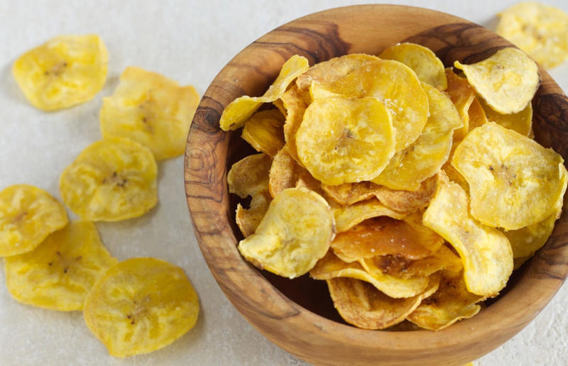 26. Plantain chips, various locations 37: Baklava, various locations, 36: Rolex, Uganda, 35: Dadar gulung, Indonesia, 34: Ta'ameya, Egypt, 33: Brownies, USA, 32: Plantain chips, various locations, 31: Koeksister, South Africa, 30: Ma'amoul, Egypt, 29: Takoyaki, Japan, 28: Rice Krispie treats, USA, 27: Poffertjes, Netherlands, 26: Haggis bon bons, Scotland, 25: Pão de queijo, Brazil, 24: Chocolate digestives, UK, 23: Churros, Spain, 22: Kartoffelpuffer, Germany, 21: Stroopwafel, Netherlands, 20: Mooncake, China, 19: Sausage roll, UK, 18: Biltong, South Africa, 17: Aloo tikki, India, 16: Qatayef, Middle East, 15: Lamington, Australia, 14: S'mores, USA, 13: Meat pie, Australia and New Zealand, 12: Lumpia, Indonesia and the Philippines, 11: Nanaimo bar, Canada, 10: Pain au chocolat, France, 9: Mochi, Japan, 8: Pani puri, India, 7: Doughnut, various locations, 6: Poutine, Canada, 5: Currywurst, Germany, 4: Macaron, France, 3: Nachos, Mexico, 2: Samosa, various locations