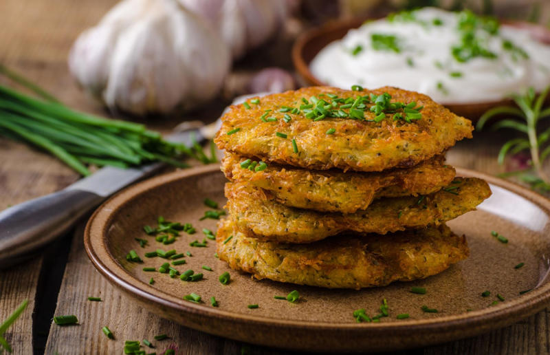 19. Kartoffelpuffer, Germany 37: Baklava, various locations, 36: Rolex, Uganda, 35: Dadar gulung, Indonesia, 34: Ta'ameya, Egypt, 33: Brownies, USA, 32: Plantain chips, various locations, 31: Koeksister, South Africa, 30: Ma'amoul, Egypt, 29: Takoyaki, Japan, 28: Rice Krispie treats, USA, 27: Poffertjes, Netherlands, 26: Haggis bon bons, Scotland, 25: Pão de queijo, Brazil, 24: Chocolate digestives, UK, 23: Churros, Spain, 22: Kartoffelpuffer, Germany, 21: Stroopwafel, Netherlands, 20: Mooncake, China, 19: Sausage roll, UK, 18: Biltong, South Africa, 17: Aloo tikki, India, 16: Qatayef, Middle East, 15: Lamington, Australia, 14: S'mores, USA, 13: Meat pie, Australia and New Zealand, 12: Lumpia, Indonesia and the Philippines, 11: Nanaimo bar, Canada, 10: Pain au chocolat, France, 9: Mochi, Japan, 8: Pani puri, India, 7: Doughnut, various locations, 6: Poutine, Canada, 5: Currywurst, Germany, 4: Macaron, France, 3: Nachos, Mexico, 2: Samosa, various locations