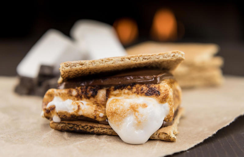 27. S'mores, USA 37: Baklava, various locations, 36: Rolex, Uganda, 35: Dadar gulung, Indonesia, 34: Ta'ameya, Egypt, 33: Brownies, USA, 32: Plantain chips, various locations, 31: Koeksister, South Africa, 30: Ma'amoul, Egypt, 29: Takoyaki, Japan, 28: Rice Krispie treats, USA, 27: Poffertjes, Netherlands, 26: Haggis bon bons, Scotland, 25: Pão de queijo, Brazil, 24: Chocolate digestives, UK, 23: Churros, Spain, 22: Kartoffelpuffer, Germany, 21: Stroopwafel, Netherlands, 20: Mooncake, China, 19: Sausage roll, UK, 18: Biltong, South Africa, 17: Aloo tikki, India, 16: Qatayef, Middle East, 15: Lamington, Australia, 14: S'mores, USA, 13: Meat pie, Australia and New Zealand, 12: Lumpia, Indonesia and the Philippines, 11: Nanaimo bar, Canada, 10: Pain au chocolat, France, 9: Mochi, Japan, 8: Pani puri, India, 7: Doughnut, various locations, 6: Poutine, Canada, 5: Currywurst, Germany, 4: Macaron, France, 3: Nachos, Mexico, 2: Samosa, various locations