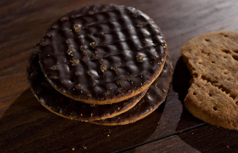 21. Chocolate digestives, UK 37: Baklava, various locations, 36: Rolex, Uganda, 35: Dadar gulung, Indonesia, 34: Ta'ameya, Egypt, 33: Brownies, USA, 32: Plantain chips, various locations, 31: Koeksister, South Africa, 30: Ma'amoul, Egypt, 29: Takoyaki, Japan, 28: Rice Krispie treats, USA, 27: Poffertjes, Netherlands, 26: Haggis bon bons, Scotland, 25: Pão de queijo, Brazil, 24: Chocolate digestives, UK, 23: Churros, Spain, 22: Kartoffelpuffer, Germany, 21: Stroopwafel, Netherlands, 20: Mooncake, China, 19: Sausage roll, UK, 18: Biltong, South Africa, 17: Aloo tikki, India, 16: Qatayef, Middle East, 15: Lamington, Australia, 14: S'mores, USA, 13: Meat pie, Australia and New Zealand, 12: Lumpia, Indonesia and the Philippines, 11: Nanaimo bar, Canada, 10: Pain au chocolat, France, 9: Mochi, Japan, 8: Pani puri, India, 7: Doughnut, various locations, 6: Poutine, Canada, 5: Currywurst, Germany, 4: Macaron, France, 3: Nachos, Mexico, 2: Samosa, various locations