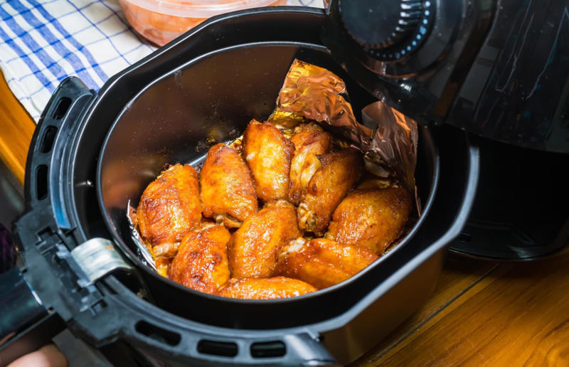 Surprisingly tasty air fryer ideas, Sausage rolls, Loaded potato skins, Kale crisps, 'Roasted' nuts, Baba ganoush, Poached eggs, Yorkshire puddings, Soufflés, Fish in a parcel, Lamb koftas, Chicken wings, Greek-style lamb cutlets, Chicken satay with peanut sauce, Glazed ham, Cheese toastie, Cheese scones, Soda bread, Oat bars, Fruit crumbles, Chocolate fondants