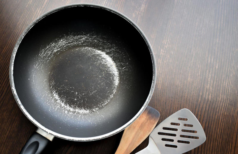 18. Using damaged non-stick cookware 37. Pouring hot liquids into cold glassware, 36. Not rotating store cupboard items, 35. Overcrowding the refrigerator, 34. Microwaving liquids for too long, 33. Lining the bottom of the oven with aluminium foil, 32. Leaving plates or cookware on unstable surfaces, 31. Using glassware on the stove, 30. Not securing cutting boards or mixing bowls, 29. Never checking the refrigerator temperature, 28. Using plastic containers in the microwave, 27. Using the same utensil for everything, 26. Not using the oven extractor fan, 25. Letting your pets roam the kitchen while you cook, 24. Storing heavy items on high shelves, 23. Not storing leftover food correctly, 22. Overheating non-stick cookware, 21. Using damaged non-stick cookware, 20. Going barefoot while cooking, 19. Storing raw meat and ready-to-eat food together, 18. Not storing knives properly, 17. Thawing meat at room temperature, 16. Not cleaning the oven extractor hood filter, 15. Not washing your hands, 14. Using knives carelessly, 13. Stacking dishwashers incorrectly, 12. Using one towel for everything, 11. Washing raw meat in the sink, 10. Storing cleaning products near food, 9. Not separating raw meat from ready-to-eat foods, 8. Using appliances incorrectly, 7. Getting distracted when cooking, 6. Using wet or damaged oven gloves and towels, 5. Touching electrical appliances with wet hands, 4. Wearing loose clothing when cooking, 3. Leaving the stove unattended, 2. Pouring water over a grease fire