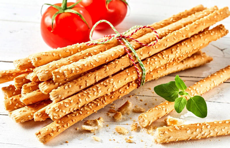32. Grissini, Italy 33. Mielie bread, South Africa, 32. Grissini, Italy, 31. Arepa, Colombia and Venezuela, 30. Injera, Eritrea and Ethiopia, 29. Knäckebröd, Sweden, 28. Rēwena bread, New Zealand, 27. Brioche, France, 26. Khameer flatbread, UAE, 25. Damper, Australia, 24. Bannock, Canada, 23. Pumpernickel, Germany, 22. Pane carasau, Italy, 21. Broa, Portugal, 20. Korovai, Ukraine, 19. Obwarzanek Krakowski, Poland, 18. Paratha, India, 17. Focaccia, Italy, 16. Manakeesh, Middle East, 15. Submarine roll, USA, 14. Pupusa, El Salvador, 13. Soda bread, Ireland, 12. Pretzel, Germany, 11. Challah, Israel, 10. Shokupan, Japan, 9. English Muffin, England, UK, 8. Chapati, India, 7. Pitta, Greece, Middle East, 6. Mantou, China, 5. Bagel, Canada, Poland, and USA, 4. Tortilla, Mexico, 3. Ciabatta, Italy, 2. Naan, India
