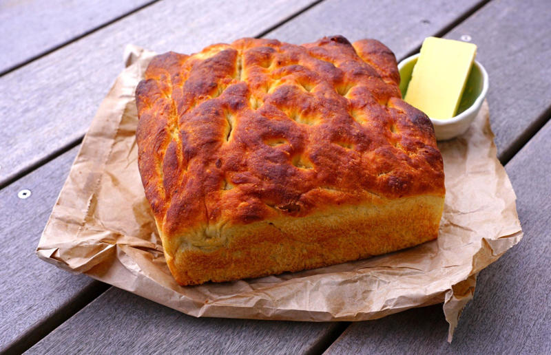 28. Rēwena bread, New Zealand 33. Mielie bread, South Africa, 32. Grissini, Italy, 31. Arepa, Colombia and Venezuela, 30. Injera, Eritrea and Ethiopia, 29. Knäckebröd, Sweden, 28. Rēwena bread, New Zealand, 27. Brioche, France, 26. Khameer flatbread, UAE, 25. Damper, Australia, 24. Bannock, Canada, 23. Pumpernickel, Germany, 22. Pane carasau, Italy, 21. Broa, Portugal, 20. Korovai, Ukraine, 19. Obwarzanek Krakowski, Poland, 18. Paratha, India, 17. Focaccia, Italy, 16. Manakeesh, Middle East, 15. Submarine roll, USA, 14. Pupusa, El Salvador, 13. Soda bread, Ireland, 12. Pretzel, Germany, 11. Challah, Israel, 10. Shokupan, Japan, 9. English Muffin, England, UK, 8. Chapati, India, 7. Pitta, Greece, Middle East, 6. Mantou, China, 5. Bagel, Canada, Poland, and USA, 4. Tortilla, Mexico, 3. Ciabatta, Italy, 2. Naan, India