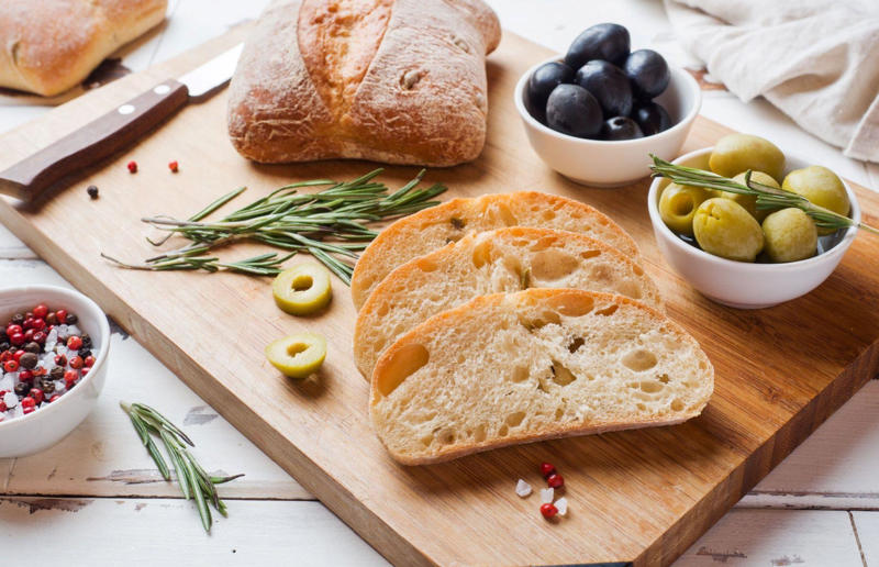 3. Ciabatta, Italy 33. Mielie bread, South Africa, 32. Grissini, Italy, 31. Arepa, Colombia and Venezuela, 30. Injera, Eritrea and Ethiopia, 29. Knäckebröd, Sweden, 28. Rēwena bread, New Zealand, 27. Brioche, France, 26. Khameer flatbread, UAE, 25. Damper, Australia, 24. Bannock, Canada, 23. Pumpernickel, Germany, 22. Pane carasau, Italy, 21. Broa, Portugal, 20. Korovai, Ukraine, 19. Obwarzanek Krakowski, Poland, 18. Paratha, India, 17. Focaccia, Italy, 16. Manakeesh, Middle East, 15. Submarine roll, USA, 14. Pupusa, El Salvador, 13. Soda bread, Ireland, 12. Pretzel, Germany, 11. Challah, Israel, 10. Shokupan, Japan, 9. English Muffin, England, UK, 8. Chapati, India, 7. Pitta, Greece, Middle East, 6. Mantou, China, 5. Bagel, Canada, Poland, and USA, 4. Tortilla, Mexico, 3. Ciabatta, Italy, 2. Naan, India