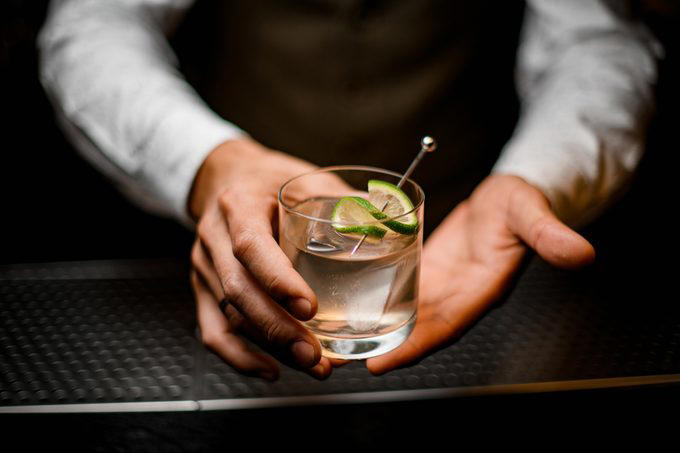 The dos and don’ts of bar etiquette, Asking them to do a shot with you, Picking up your drink before they give it to you, Cleaning up broken glass, Itemizing and splitting a tab, Stuffing napkins, straw wrappers or other trash into your cup, Telling them your life story, Asking them out, Reaching over or behind the bar to grab something quickly, Buying a round of drinks, Asking them to “surprise you” with a drink, Requesting a custom cocktail or ordering off-menu, Using beverage napkins to clean up a spill, Handing them a wad of cash, Getting creative with the tip, Not bothering them with safety concerns, Keeping things simple without a menu, About the experts, Why trust us