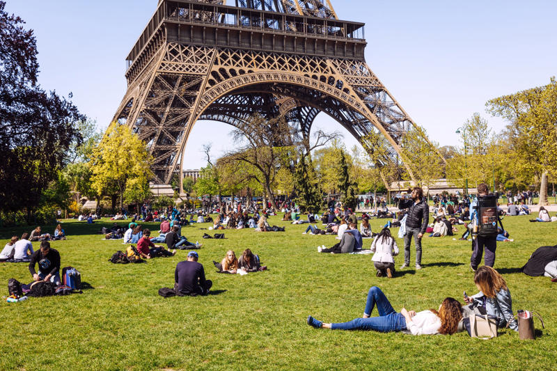 1. Picnic under the Eiffel Tower , 2. Sunset cruise down the Seine , 3. Indulge in Montmartre’s café culture , 4. Shop vintage in Le Marais , 5. Stroll the Palace of Versailles, 6. Marvel at gallery masterpieces , 7. Take a dip in the Josephine Baker Pool, 8. Embrace festivities at the Christmas markets , 9. Catch kick-off at a Paris Saint-Germain game, 10. Savour a sidecar cocktail in the Latin Quarter, 11. Find your style at Paris Fashion Week , 12. Get a taste of Parisian cuisine