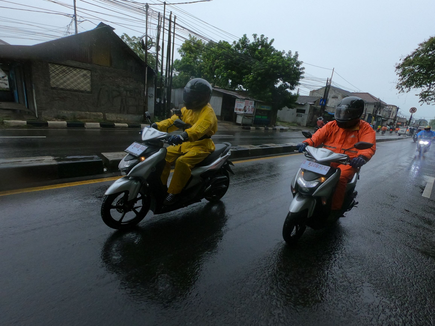 musim hujan, hujan, tarikan enteng, VB Motor, Masuk Logika, Ini Alasan Tarikan Motor Terasa Enteng Saat Hujan