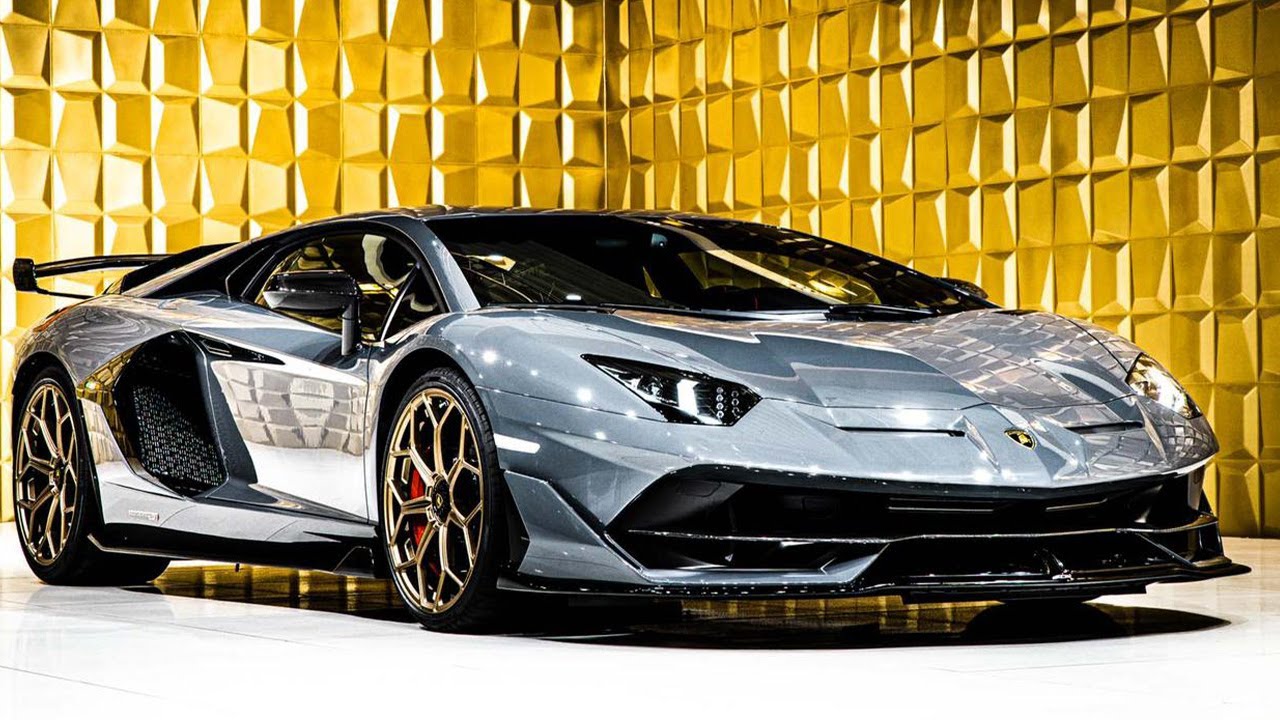 1. Lamborghini Aventador SVJ Roadster Grigio Telesto, 2. Ferrari 488 Pista Rosso Corsa, 3. Lamborghini Huracan EVO AWD, 4. McLaren 720 S, 5. Aston Martin Vantage Coupe, 6. Tesla Model X Long Range, 7. Ferrari F430, 8. Cadillac Escalade ESV, 9. Chevrolet Camaro, 10. Mercedes Benz SLK-Class Convertible