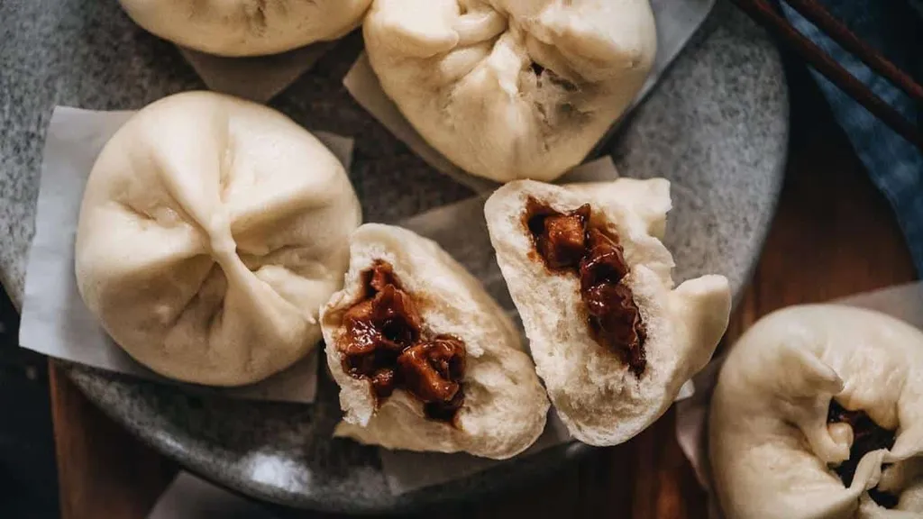 Cha siu bao, 1. Tangbao, 2. Sheng Jian, 3. Jiao Zi, 4. Goutie, 5. Wonton, 6. Siu Mai, 7. Cha Siu Bao, 8. Tangyuan, 9. Har Gow, 10. Bao Zi