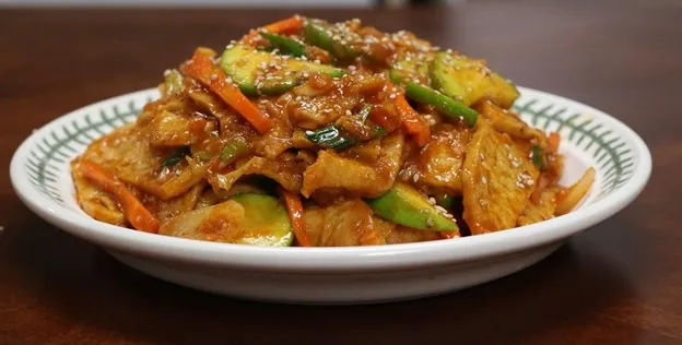 Eomuk Bokkeum, 1. Pajeon, 2. Namul Muchim, 3. Cheongpomuk, 4. Kimchi, 5. Gim Gui, 6. Gamjajeon, 7. Ojingeo Chae Bokkeum, 8. Eomuk Bokkeum, 9. Myulchi Bokkeum, 10. Hobak Bokkeum, 11. Gamja Jeorim, 12. Goguma Mattang, 13. Gyeran Mari, 14. Yeongeun Jorim