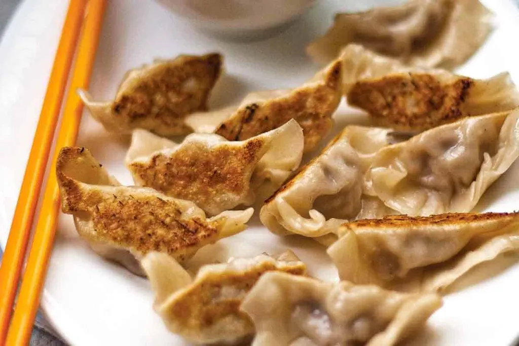 Goutie, 1. Tangbao, 2. Sheng Jian, 3. Jiao Zi, 4. Goutie, 5. Wonton, 6. Siu Mai, 7. Cha Siu Bao, 8. Tangyuan, 9. Har Gow, 10. Bao Zi