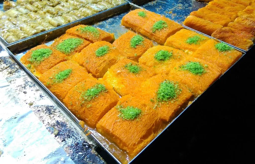 Kanafeh, 1. Maqluba, 2. Musakhan, 3. Sumaghiyyeh, 4. Mujadara, 5. Qidreh, 6. Maftoul, 7. Fatayer, 8. Sfiha, 9. Taboon Bread, 10. Kanafeh