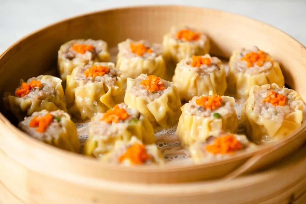 Siu Mai, 1. Tangbao, 2. Sheng Jian, 3. Jiao Zi, 4. Goutie, 5. Wonton, 6. Siu Mai, 7. Cha Siu Bao, 8. Tangyuan, 9. Har Gow, 10. Bao Zi