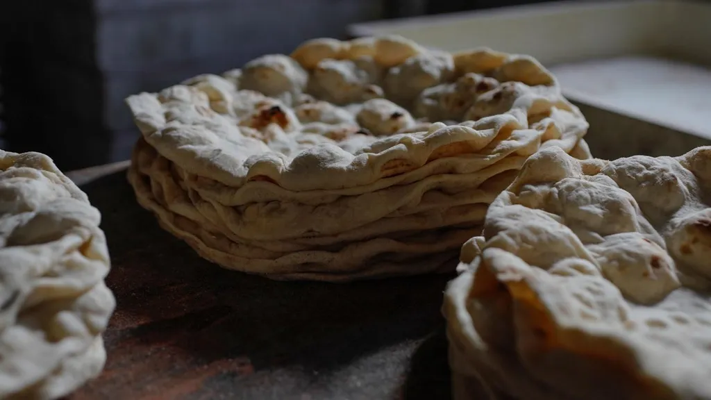 Taboon Bread, 1. Maqluba, 2. Musakhan, 3. Sumaghiyyeh, 4. Mujadara, 5. Qidreh, 6. Maftoul, 7. Fatayer, 8. Sfiha, 9. Taboon Bread, 10. Kanafeh