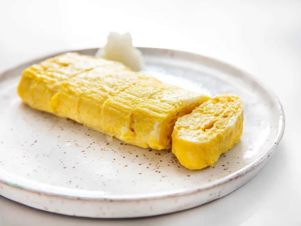 Tamagoyaki_, 1. Chawanmushi, 2. Tamago Nigiri Sushi, 3. Tamagodon, 4. Tenshindon, 5. Onsen Tamago, 6. Tamagoyaki, 7. Oyakodon, 8. Omurice, 9. Kinshi Tamago, 10. Tamago Kake Gohan