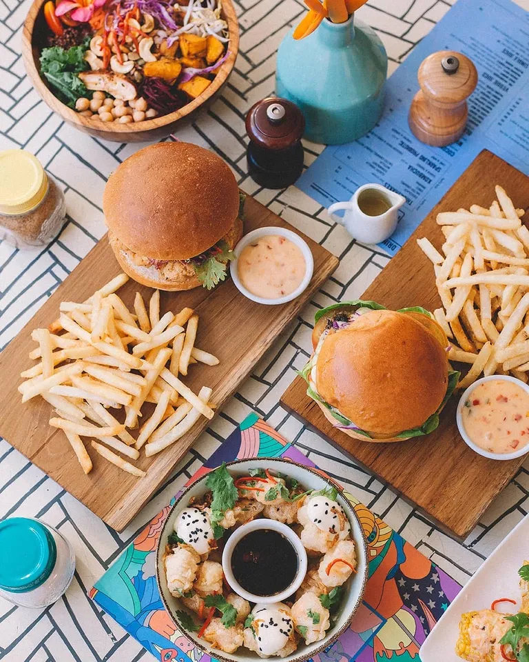 Burger, 1. Fairy Floss Pancakes, 2. Quinoa, Feta &amp; Avo Salad, 3. Egg Benedict, 4. Chicken Taco, 5. Scrambled Tofu, 6. Summer Poke Bowl, 7. Burger, 8. Jamaican Spiced Chicken, 9. Hot Churros, 10. Paket Hangover Meal