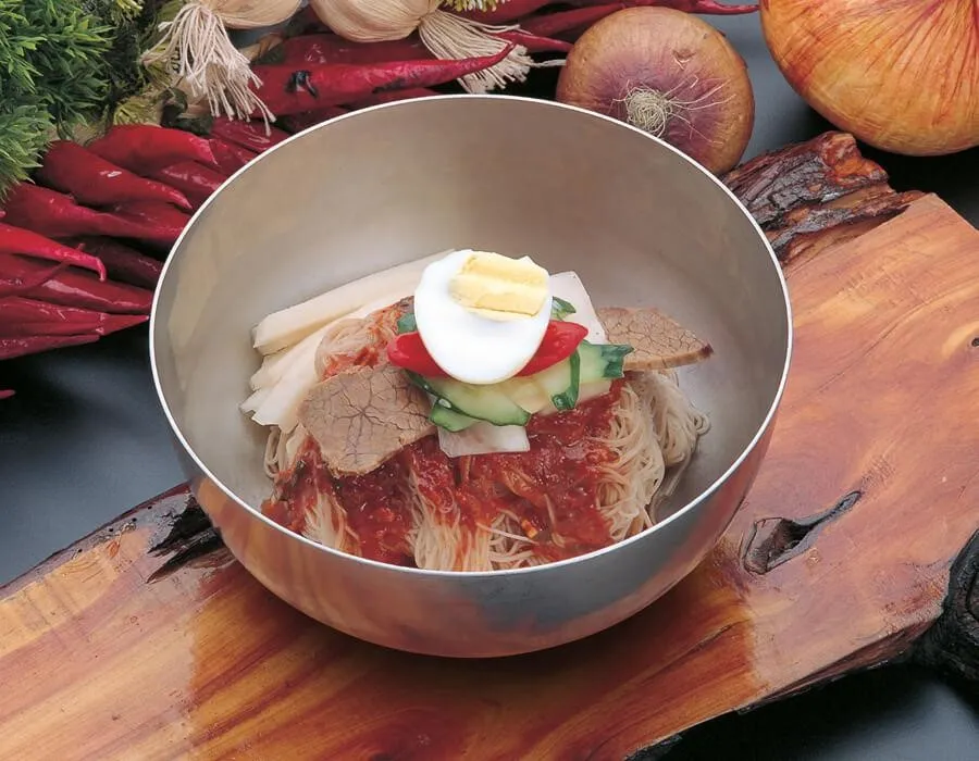 Bibim Naengmyeon, 1. Kimchi Jjigae , 2. Kimchi, 3. Yangnyeom Galbi, 4. Sundubu Jjigae, 5. Bibim Naengmyeon, 6. Haemul Pajeon, 7. Chadol Doenjang Jjigae, 8. Woo Samgyeop, 9. Chicken Ganjang Barbecue , 10. Yesan Tteokgalbi