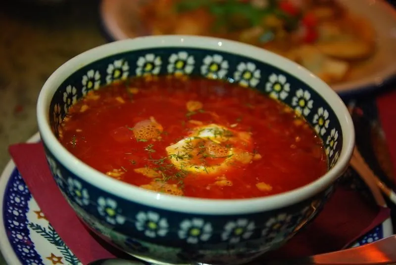 Borscht, 1. Borscht, 2. Pelmeni, 3. Blini, 4. Pirozhki, 5. Shashlik, 6. Kholodets, 7. Oladyi, 8. Solyanka, 9. Okroshka, 10. Beef Stroganoff