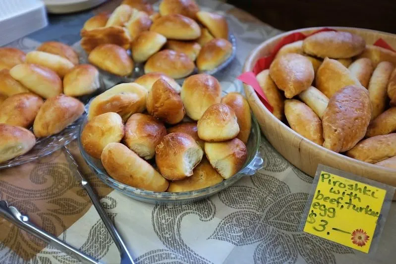 Pirozhki, 1. Borscht, 2. Pelmeni, 3. Blini, 4. Pirozhki, 5. Shashlik, 6. Kholodets, 7. Oladyi, 8. Solyanka, 9. Okroshka, 10. Beef Stroganoff
