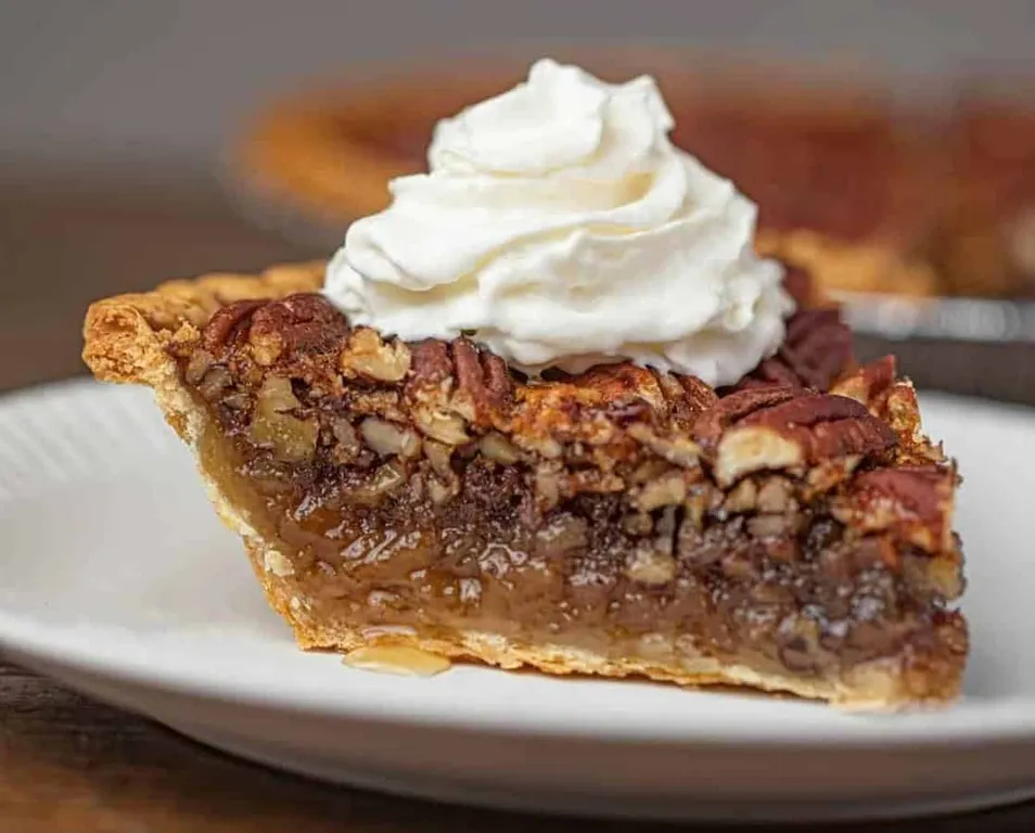 Pecan Pie_, 1. Peach Cobbler, 2. Apple Pie, 3. Pecan Pie, 4. Strawberry Rhubarb Pie, 5. Sugar Pie, 6. Sweet Potato Pie, 7. Cream Pie, 8. Pumpkin Pie, 9. Chess Pie, 10. Peanut Butter Pie