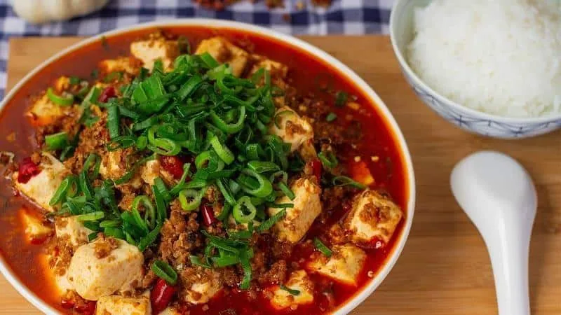 Mapo Tofu_, 1. Hotpot, 2. Bebek Peking, 3. Mapo Tofu, 4. Kung Pao Chicken, 5. Cheng Fun (Steamed Vermicelli Rolls), 6. Dim sum, 7. Sweet and Sour Pork, 8. Lumpia Goreng, 9. Wonton , 10. Nasi Goreng Yangzhou