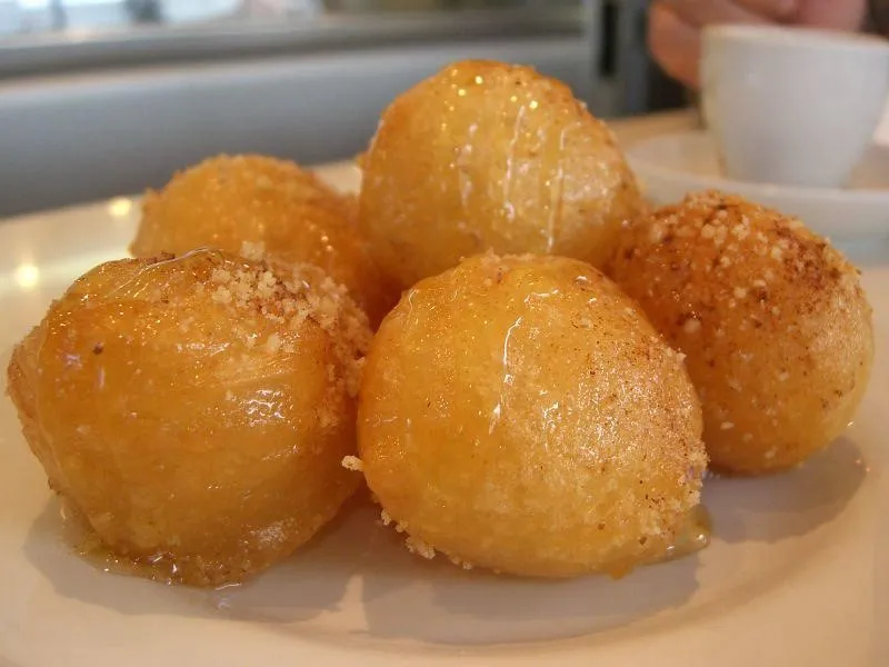 Loukoumades, 1. Revani, 2. Melomakarona, 3. Kourabiedes, 4. Tulumba, 5. Galaktoboureko, 6. Melopita, 7. Rizogalo, 8. Baklava, 9. Loukoumades, 10. Sokolatopita