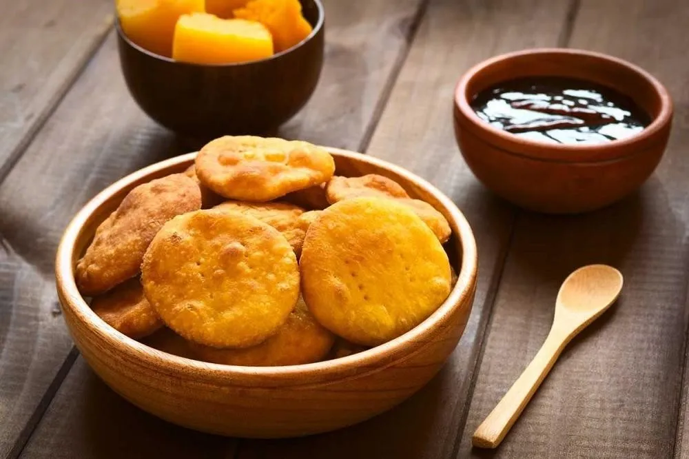 Sopapillas, 1. Leche Asada, 2. Alfajores, 3. Sopapillas, 4. Torta de Mil Hojas, 5. Kuchen, 6. Cuchufli, 7. Torta Tres Leches, 8. Cocada, 9. Empanada de Manzana, 10. Brazo de Reina